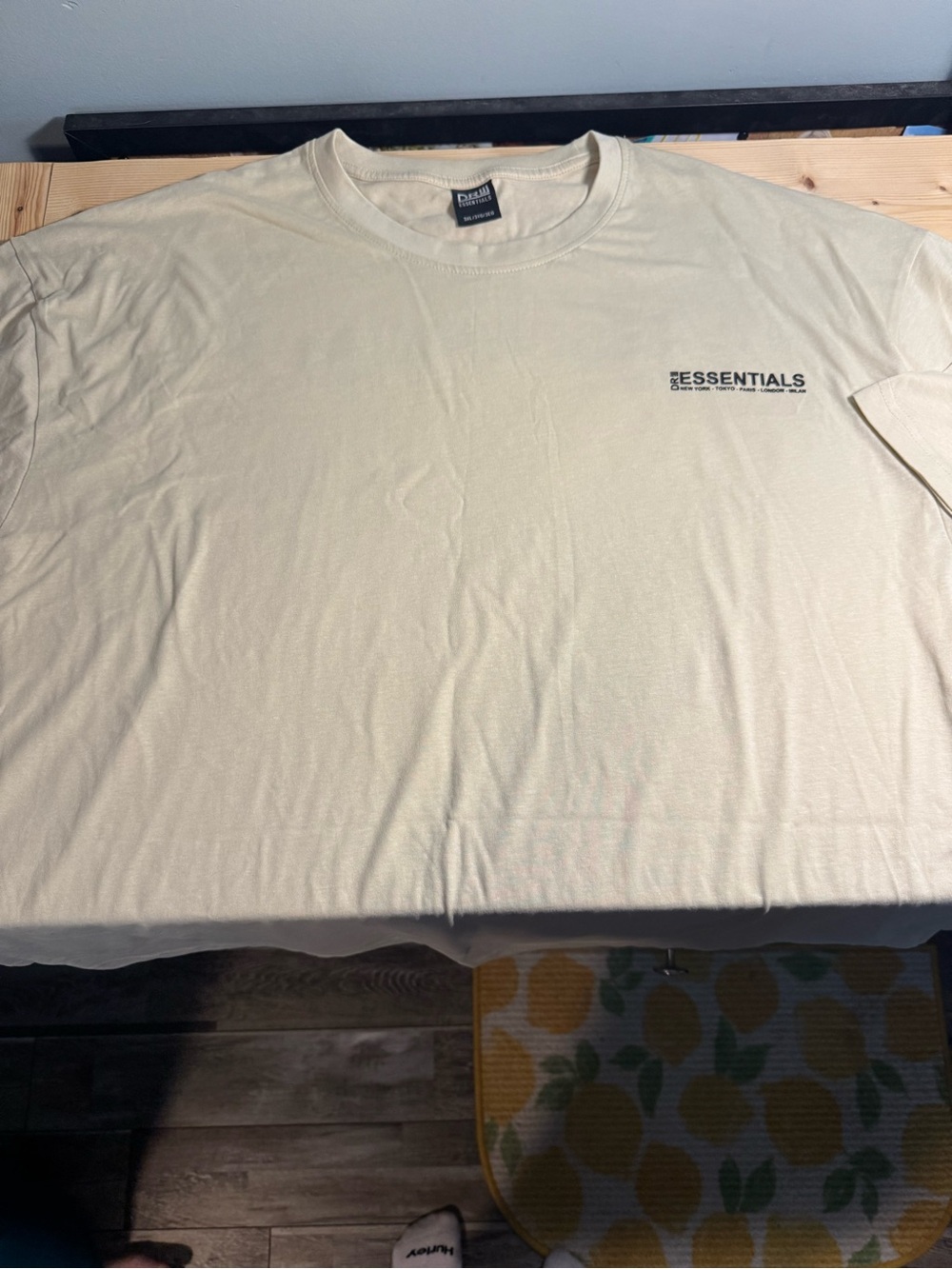 ESSENTIALS Men’s Cream Short Sleeve Logo Tee